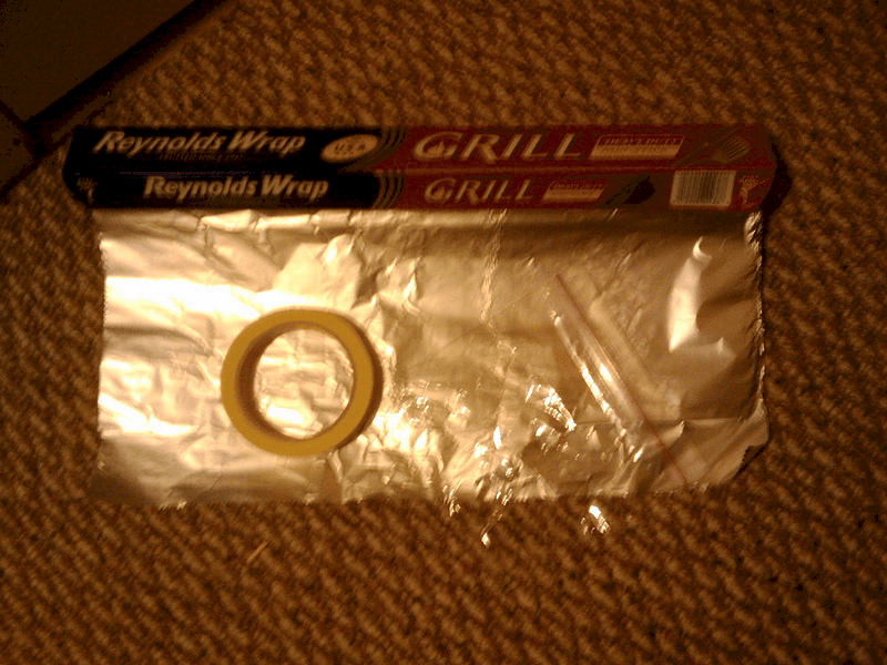 roll of aluminum foil and freezer tape