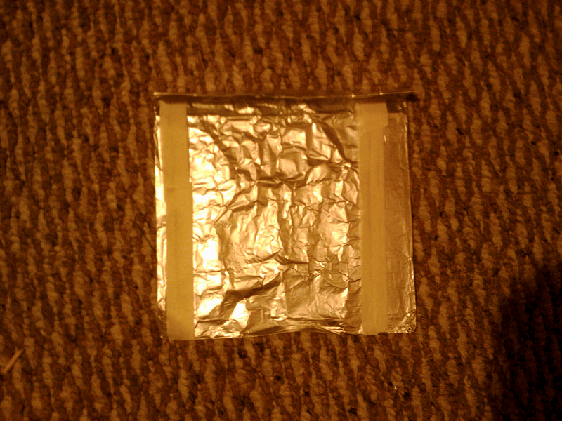 sides of aluminum foil fully folded
