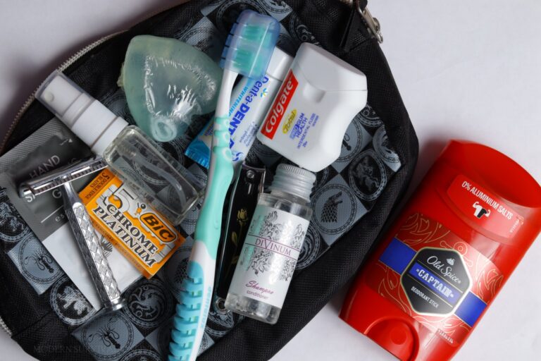 hygiene kit with toothbrush floss deodorant razor shampoo inside pouch