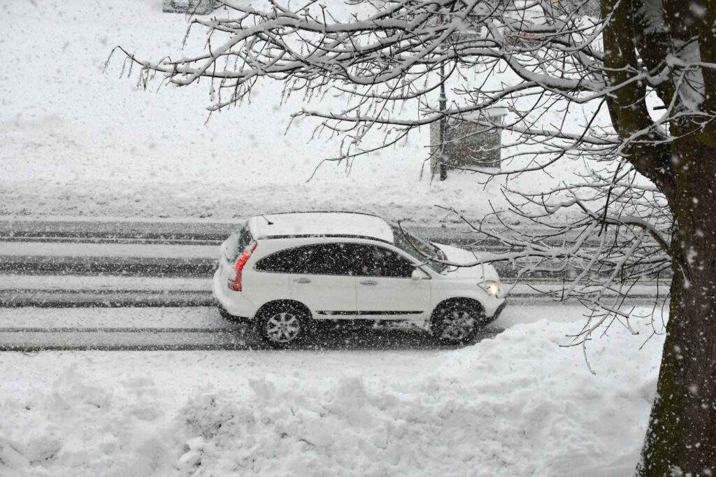 car in snowstorm
