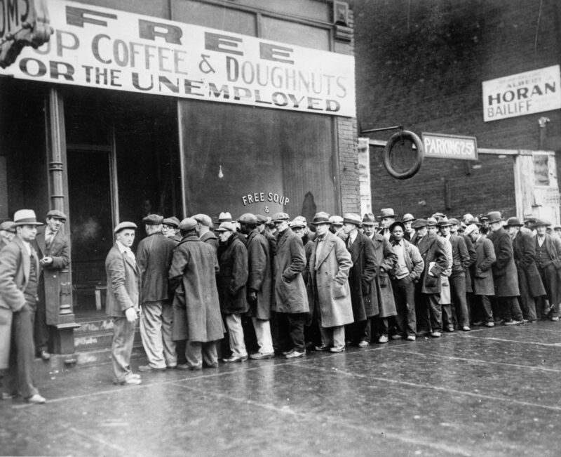 unemployed men queued outside a depression soup kitchen