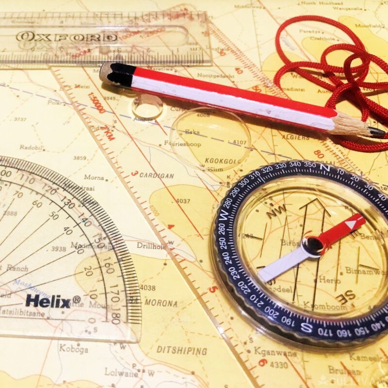 map compass protractor pencil, and string