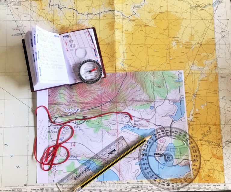 topographic map, 2d map, notebook, pencil, and ruler