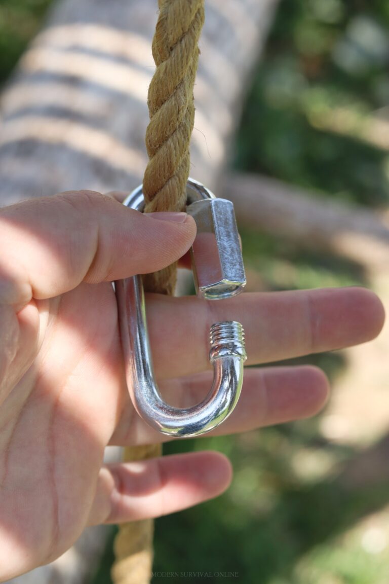 oval-shaped carabiner attached to rope